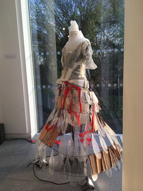 glass dress, cast glass swan's feathers, enamelled metal on a flexible glass fibre rod frame, with corset, embodied grief 