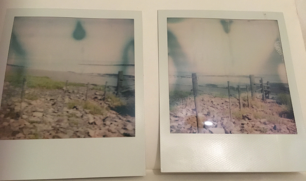 Polaroid pictures of a fence at black rock nature reserve that goes from beach into the sea