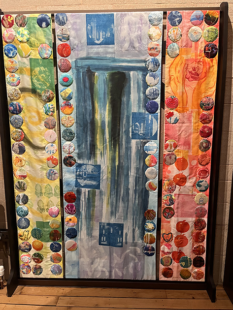 Close up of Textile triptych commission in Treasures Exhibition Exeter Cathedral.