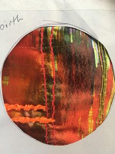 circular textile jewel with embroidery