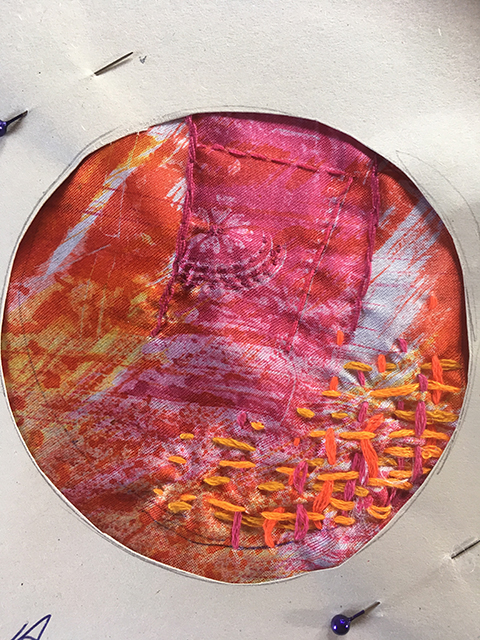 circular textile jewel with embroidery