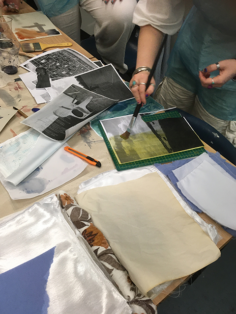 Workshop for textile triptych showing painting dyes on paper