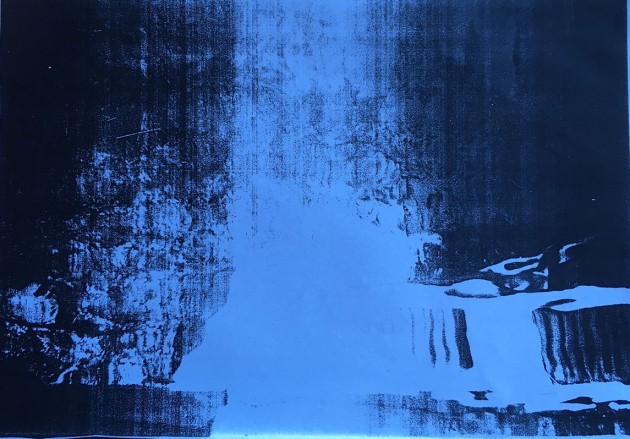 a photocopy of an abstract image of reflections in water, black on blue.