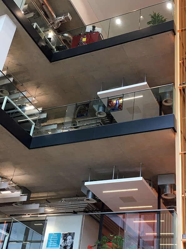 View of panels from below, looking up into atrium space at Abcam