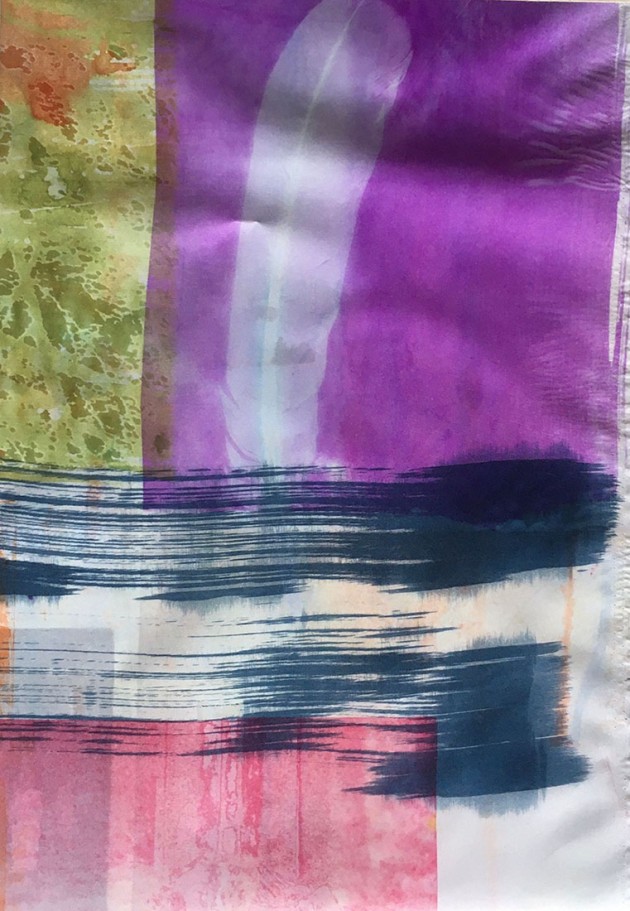 heat transfer print on fabric silhouette of a feather on pink with green leaves and blue brush mark.