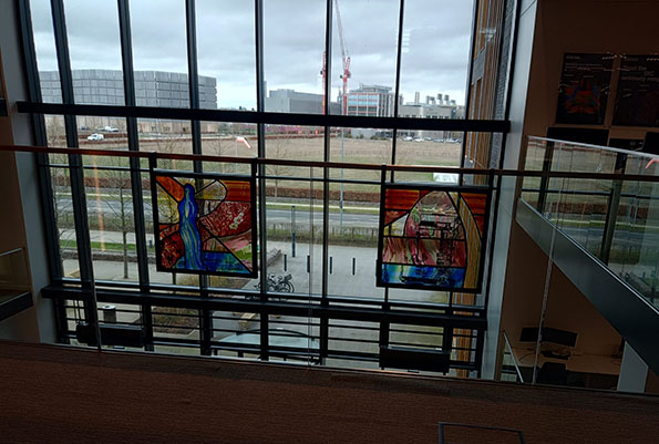 view of leaded panels affixed to glass balustrade at Abcam