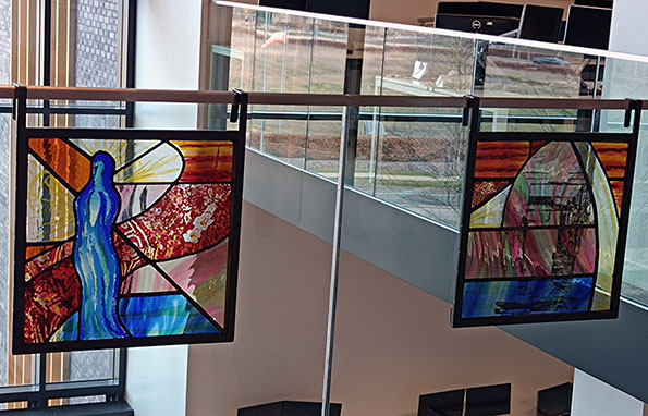 leaded panels affixed to glass balsutrade